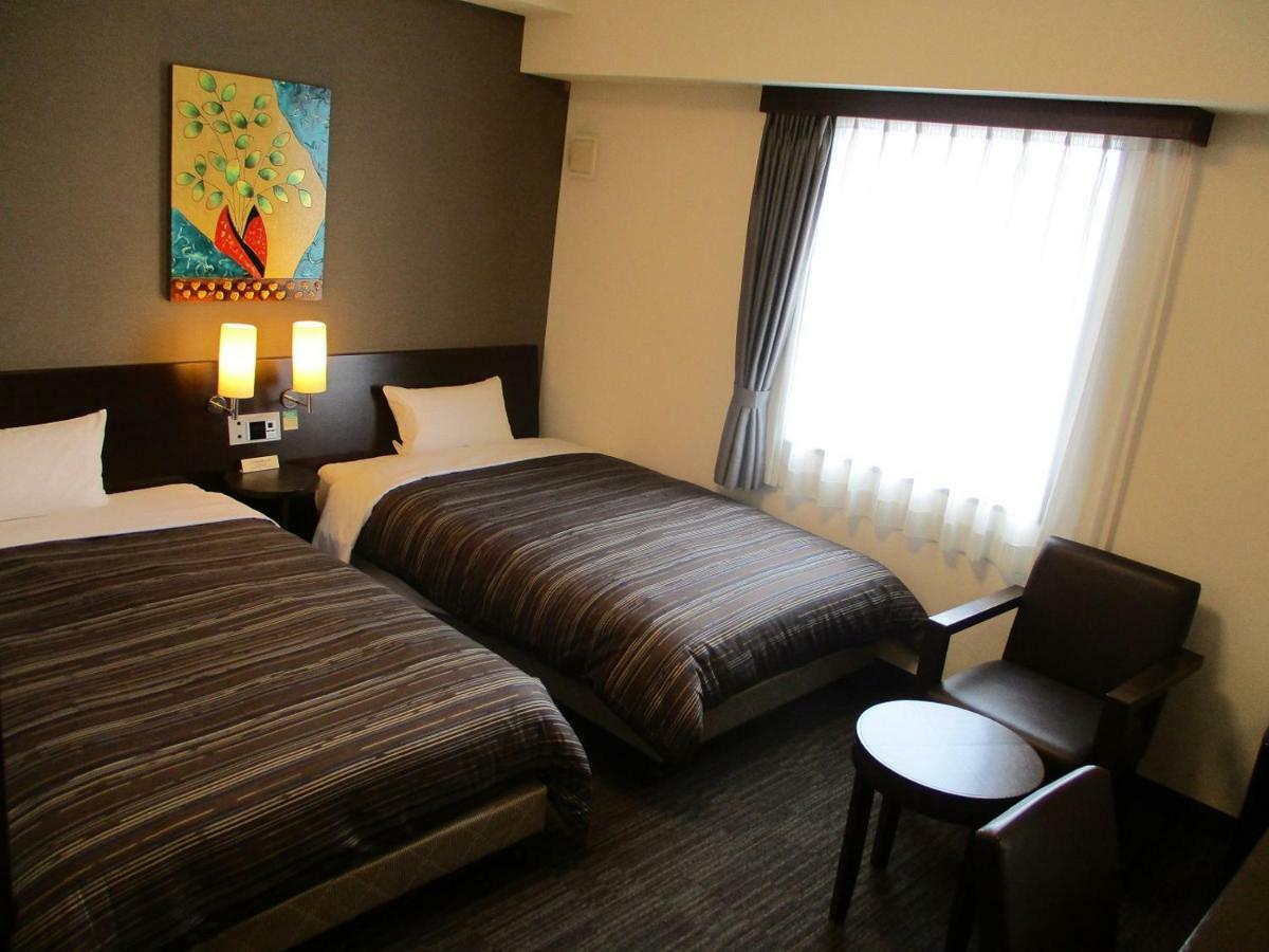 Hotel Route-Inn Kitakyushu-Wakamatsu Ekihigashi Екстериор снимка