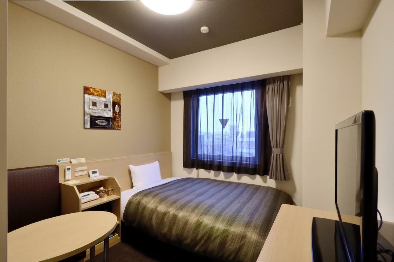 Hotel Route-Inn Kitakyushu-Wakamatsu Ekihigashi Екстериор снимка
